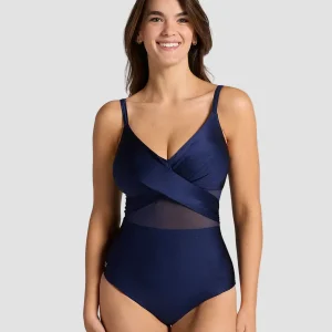 Bañador entero con escote cruzado y tela con brillo / LEONISA